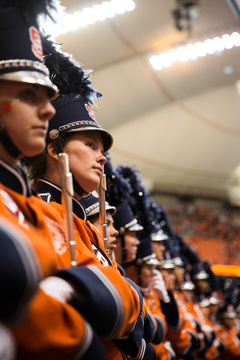 Zoe O'Leary of the SU marching band looks on, waiting for the Orange to take the field.