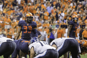 Marqez Hodge looks over the line of scrimmage in Syracuse's 27-26 win over Villanova on Friday. Hodge finished with five total tackles, two tackles for loss and a sack. 