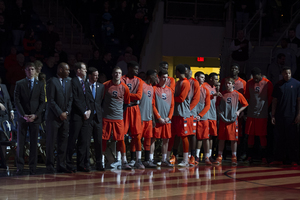 Syracuse stands on the sideline before its game against Pittsburgh on Saturday. After the game, players spoke publicly for the first time regarding the university's self-imposed postseason ban.