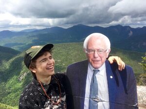 Garet Bleir scaled all 46 high peaks of the Adirondack Mountains with a cardboard cutout of Vermont senator, Bernie Sanders.