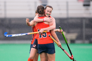 Syracuse players celebrate during the Orange's 5-0 win over Yale on Sunday. Syracuse has shut out four straight opponents and hasn't allowed a goal since Sept. 16.