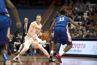 Guard Trevor Cooney looks to evade the Louisiana Tech press in the opening frame.