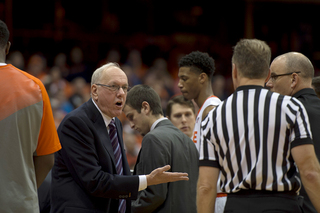 Head coach Jim Boeheim discusses a call with a referee during the second half.