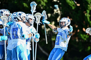 Tagliaferri celebrates with his teammates as the Tar Heels held on in the second half.